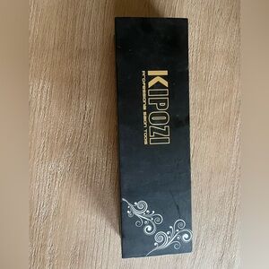 Kipozi Flat Iron (NWT in Box)